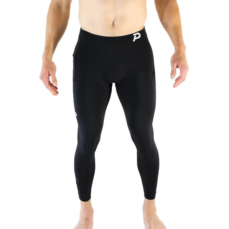 Front view of Pacterra Strider men's compression tights in black, featuring an ergonomic waistband for maximum comfort.