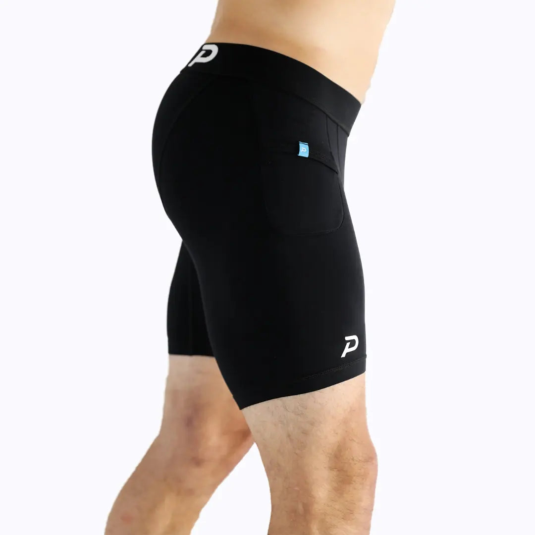 Side view of black compression shorts showing the sleek design and high-compression support for heavy lifting.