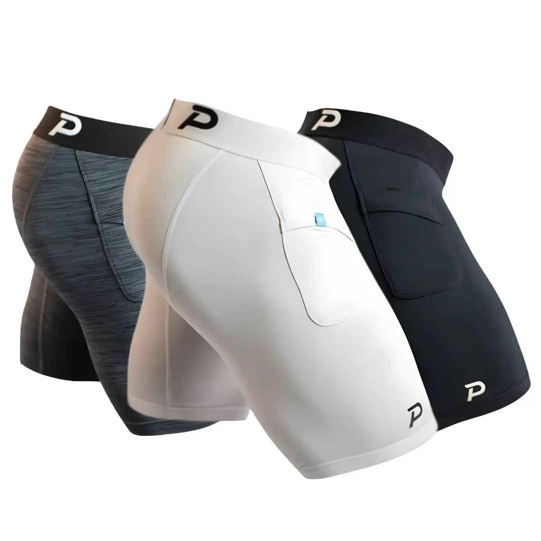 Pacterra Men's Middy 3-pack bundle in Heather Grey, White, and Black. These high-comfort compression shorts feature a secure, no-bounce side pocket and soft SwingLoft fabric for the best athletic fit.