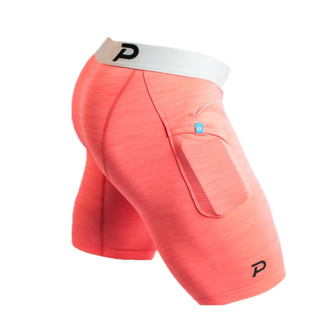 Studio profile of pink Middy compression shorts featuring the signature no-bounce secure-fold pocket.