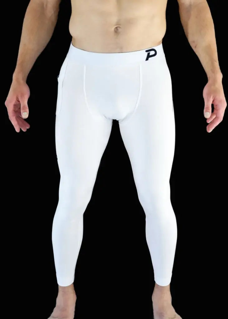 Front view of Pacterra Strider men's white compression tights, featuring high-opacity fabric for a premium base-layer look.