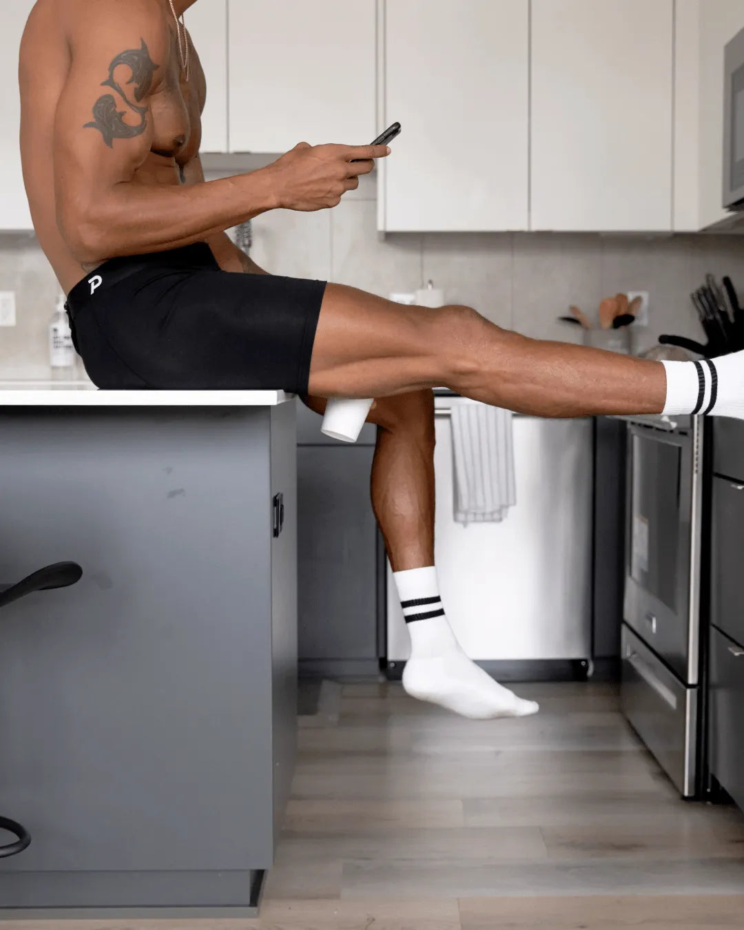 Full-length lifestyle shot of the Fiver boxer brief, representing the comfort of the fabric and fit.